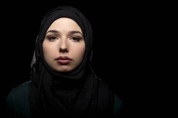 Confident Female Wearing a Black Hijab