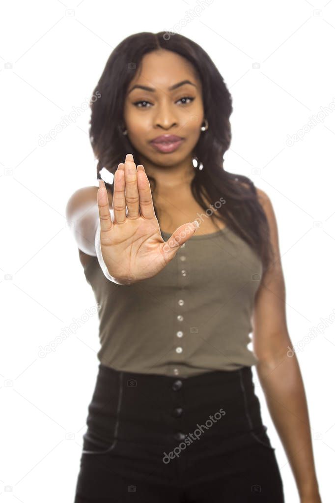 Black Female on a White Background with Stop Gestures and Expressions