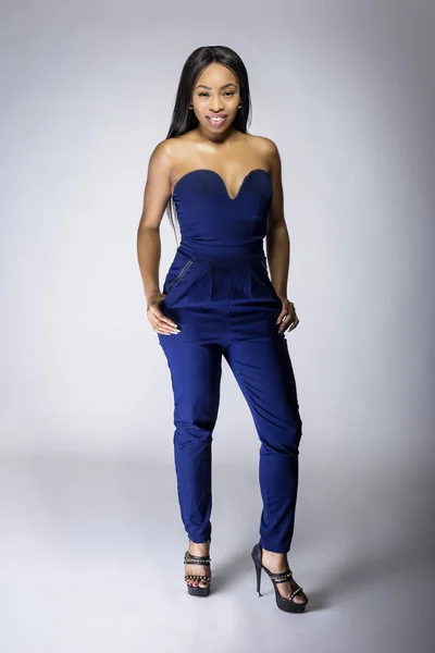 Sexy Black Female Fashion Model Wearing Apparel Blue Pants Outfit Stock  Photo by ©innovatedcaptures 187925462