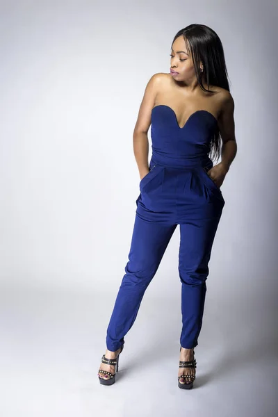 Sexy Black Female Fashion Model Wearing Apparel Blue Pants Outfit