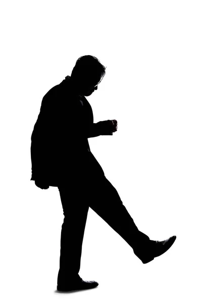 Silhouette Eines Hinterleuchteten Modells Das Als Geschäftsmann Auf Weißem Hintergrund — Stockfoto