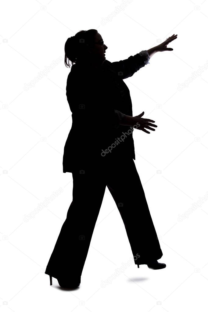 Silhouette of a curvy or plus size businesswoman on a white background for composites.  She is posed like she is falling or off balance