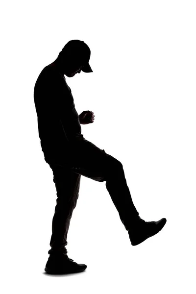 Silhouette Man Wearing Casual Clothes Isolated White Background Kicking Something — 스톡 사진