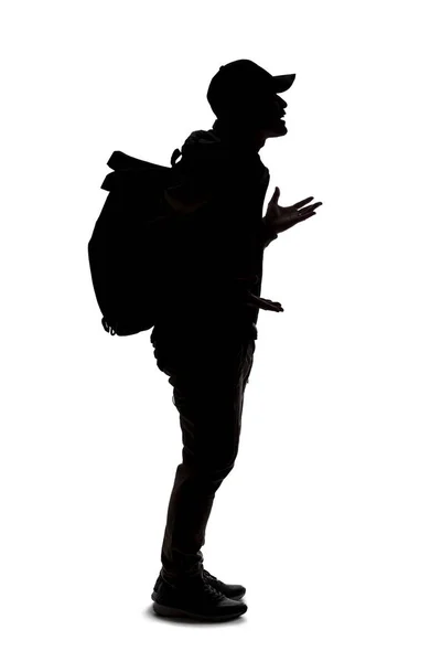 Silhouette Eines Mannes Der Einen Rucksack Trägt Und Aussieht Wie — Stockfoto