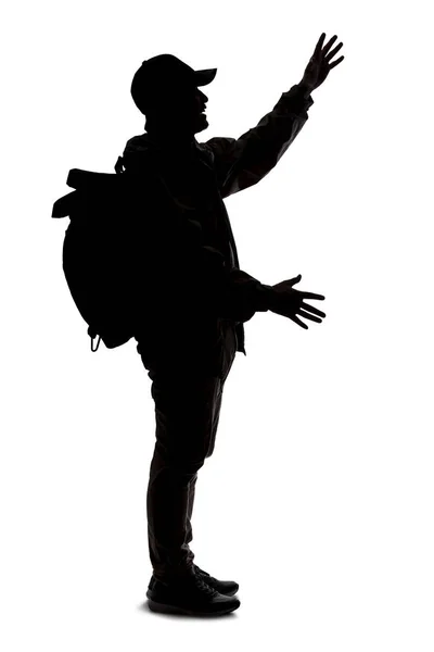 Silhouette Eines Mannes Der Einen Rucksack Trägt Und Aussieht Wie — Stockfoto