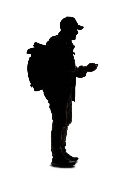 Silhouette Eines Mannes Der Einen Rucksack Trägt Und Aussieht Wie — Stockfoto