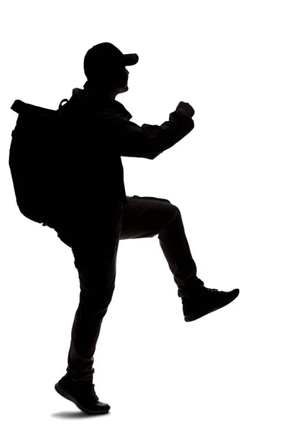 Silhouette Eines Mannes Der Einen Rucksack Trägt Und Aussieht Wie — Stockfoto