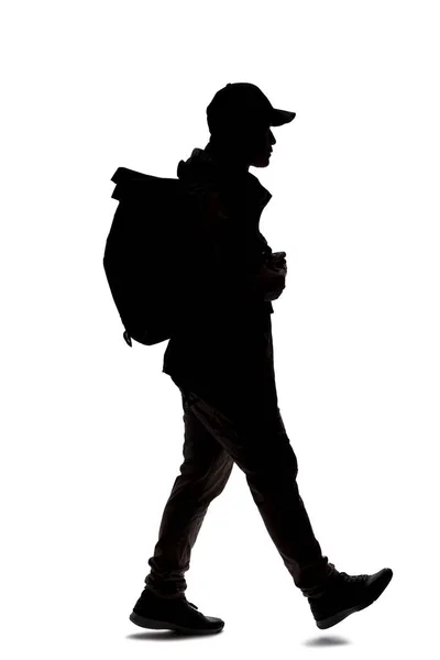 Silhouette Eines Mannes Der Einen Rucksack Trägt Und Aussieht Wie — Stockfoto