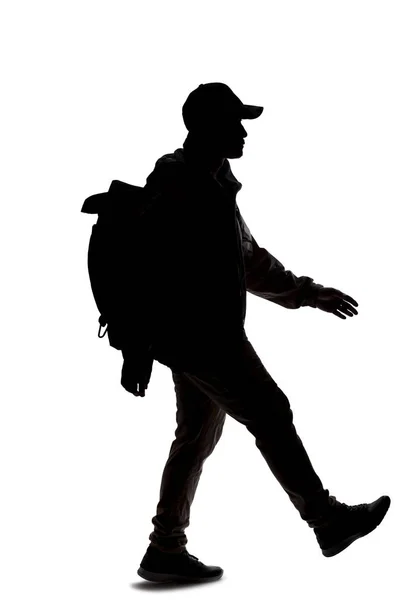 Silhouette Eines Mannes Der Einen Rucksack Trägt Und Aussieht Wie — Stockfoto