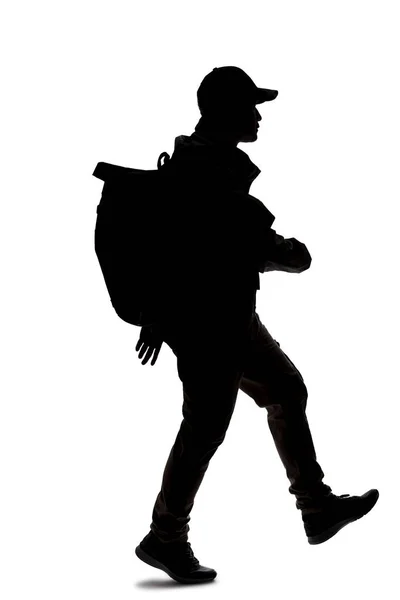 Silhouette Eines Mannes Der Einen Rucksack Trägt Und Aussieht Wie — Stockfoto