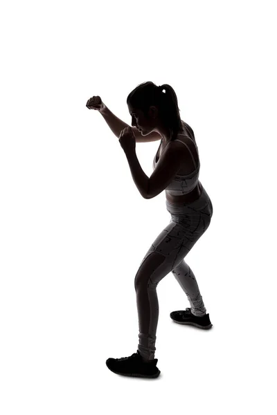 Jonge Vrouw Een Vechtende Houding Dragen Atletische Sportkleding Oefenen Door — Stockfoto