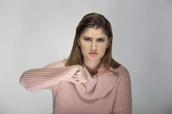 Close Portrait Young Caucasian Woman Wearing Pink Sweater Grey Background — Stock Photo, Image