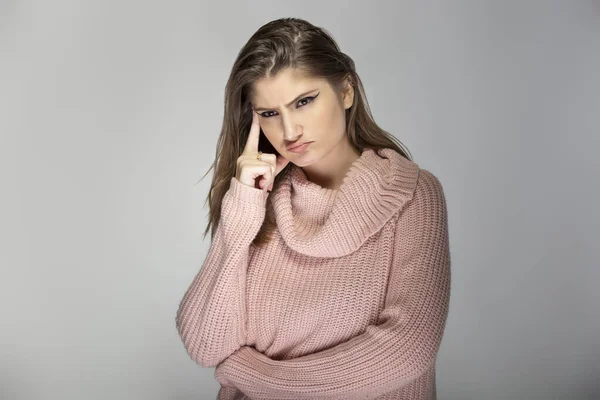 Close Portrait Young Caucasian Woman Wearing Pink Sweater Grey Background — Stock Photo, Image