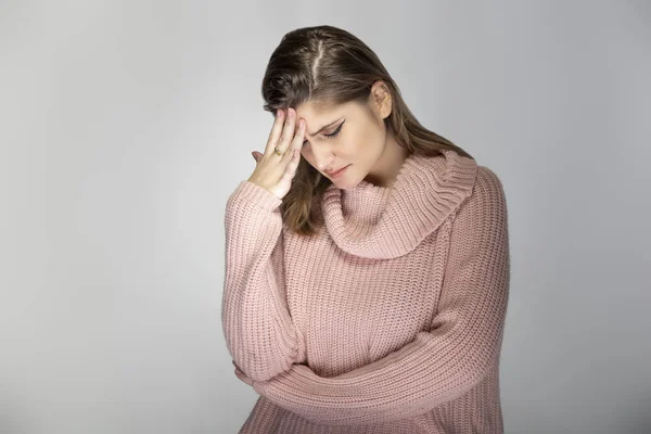 Close Portrait Young Caucasian Woman Wearing Pink Sweater Grey Background — Stock Photo, Image