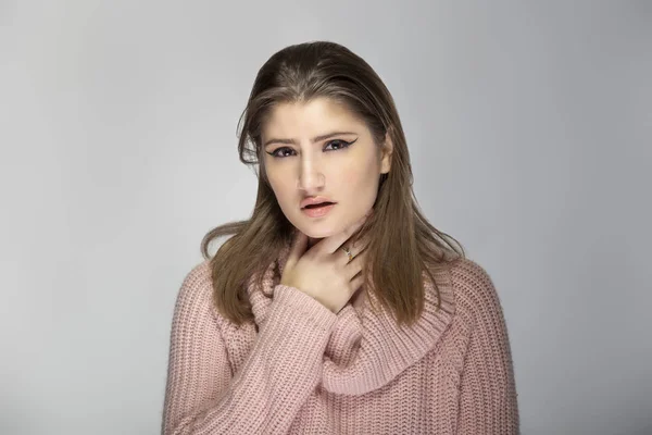 Close Portrait Young Caucasian Woman Wearing Pink Sweater Grey Background — Stock Photo, Image