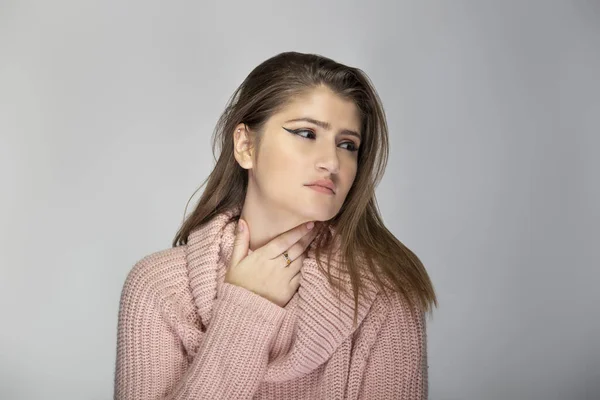 Close Portrait Young Caucasian Woman Wearing Pink Sweater Grey Background — Stock Photo, Image