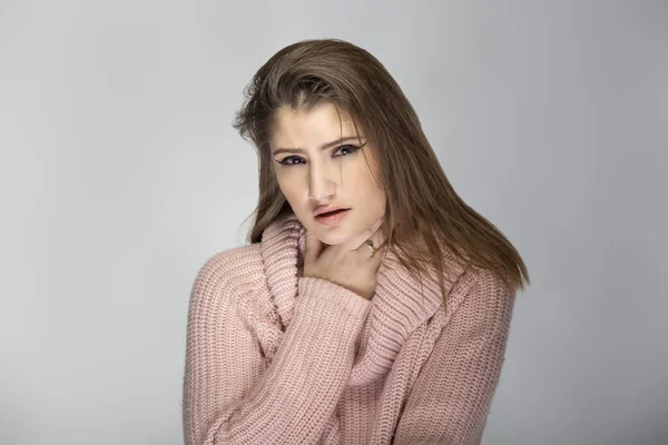 Close Portrait Young Caucasian Woman Wearing Pink Sweater Grey Background — Stock Photo, Image