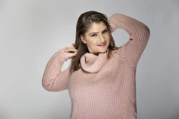 Close Portrait Young Caucasian Woman Wearing Pink Sweater Grey Background — Stock Photo, Image