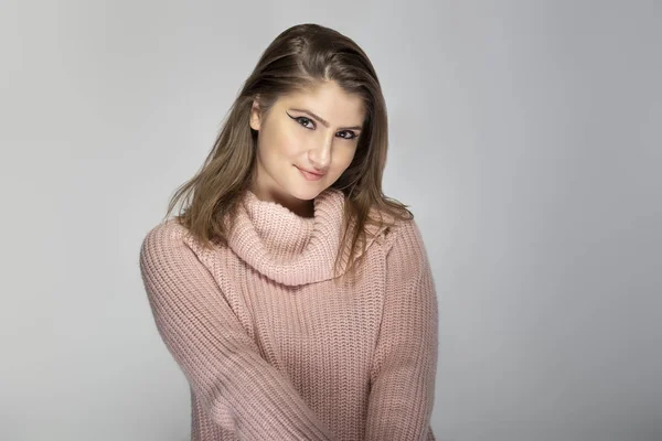 Close Portrait Young Caucasian Woman Wearing Pink Sweater Grey Background — Stock Photo, Image