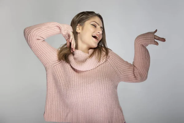 Close Portrait Young Caucasian Woman Wearing Pink Sweater Grey Background — Stock Photo, Image