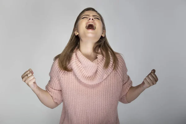 Close Portrait Young Caucasian Woman Wearing Pink Sweater Grey Background — Stock Photo, Image