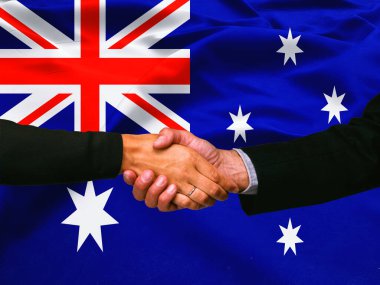 Avustralya bayrak arka planında iş tokalaşması