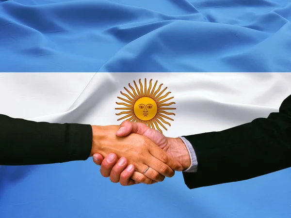 Деловое Рукопожатие Фоне Флага Аргентины — стоковое фото