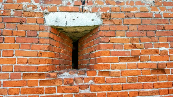 Kaçamak duvarında. Eski yıl. Şımarık tuğla vintage. Tuğla duvar kırmızı taş arka plan yaptı.