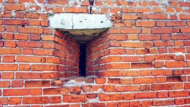 Yasal boşluk duvar. Eski yıl. Şımarık tuğla vintage. Tuğla duvar kırmızı taş arka plan yaptı.
