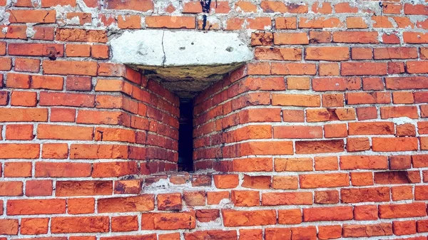 Yasal boşluk duvar. Eski yıl. Şımarık tuğla vintage. Tuğla duvar kırmızı taş arka plan yaptı.