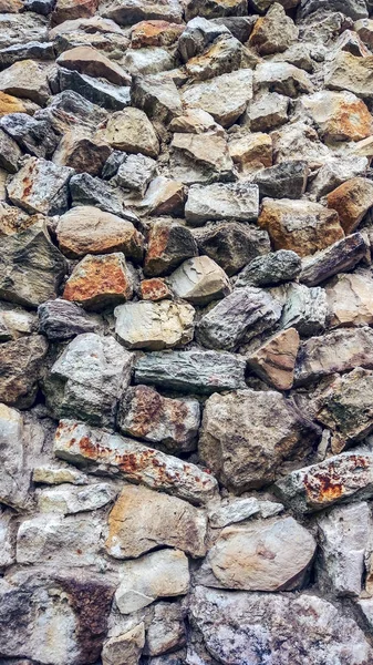 Pared vieja de piedra de bloques enormes. Fondo de piedras. El concepto de fiabilidad. Hermoso texturizado vintage antiguo fondo . — Foto de Stock