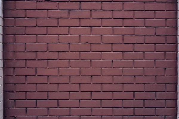 Bakstenen muur gemaakt van rode stenen achtergrond. De verwende baksteen is vintage. — Stockfoto