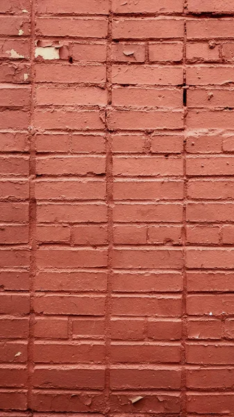 Z czerwonym tle kamienny mur z cegły. Zepsute Cegła jest vintage. — Zdjęcie stockowe