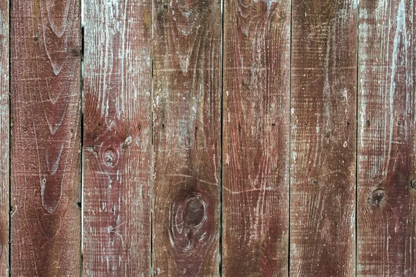 Ξύλινο υπόβαθρο. Ένα φράχτη μια φθινοπωρινή ημέρα στη φύση. Παλιές ξύλινες σανίδες. — Φωτογραφία Αρχείου