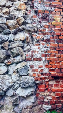 Taş eski büyük bloklardan duvar. Arka plan taş. Güzel dokulu vintage antika arka plan. Eski duvar yeni tuğla bir taşla.