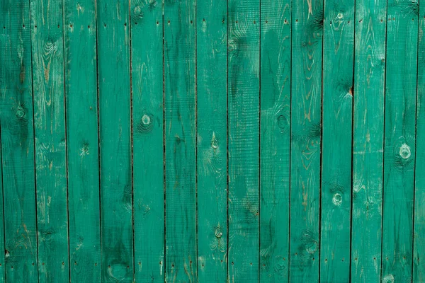 Dark lime vintage brädor. Bakgrunder och texturer staket målat. Framifrån. Locka vackra vintage bakgrund. — Stockfoto