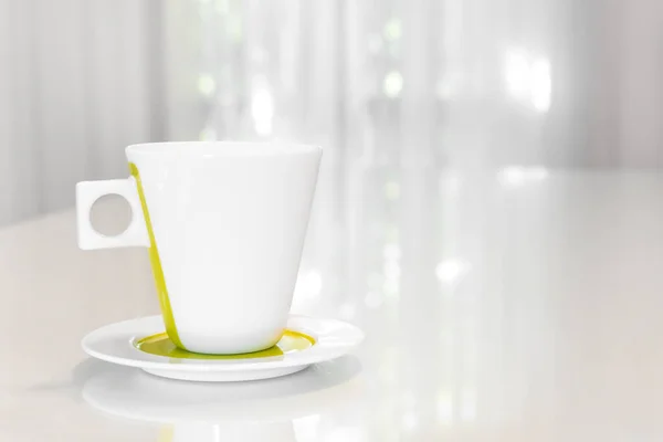 One White Mug Green Touch Color White Table Whit Its — Stock Photo, Image