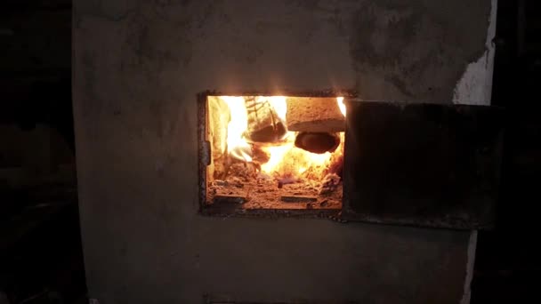 Hut Village Yellow Fire Burning Wood Oven Door Open Close — Stock Video