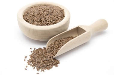 Flaxseeds ahşap kepçe ve kase