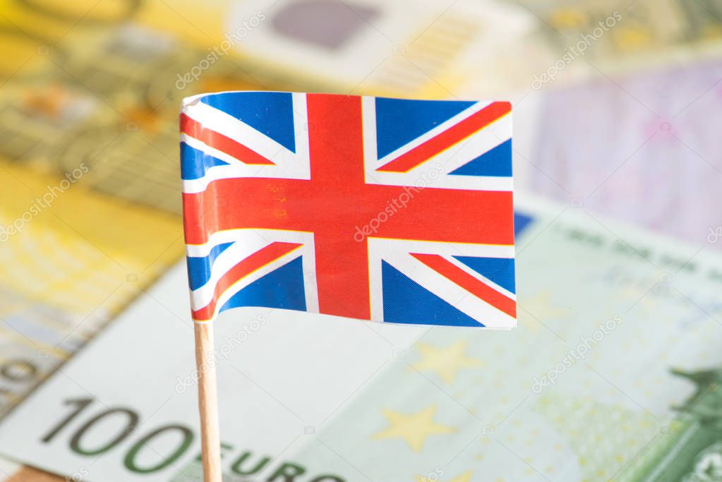 Flag of Great Britain and many euro banknotes