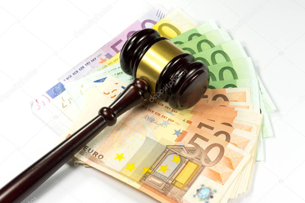 Judge gavel or auction hammer and euro money