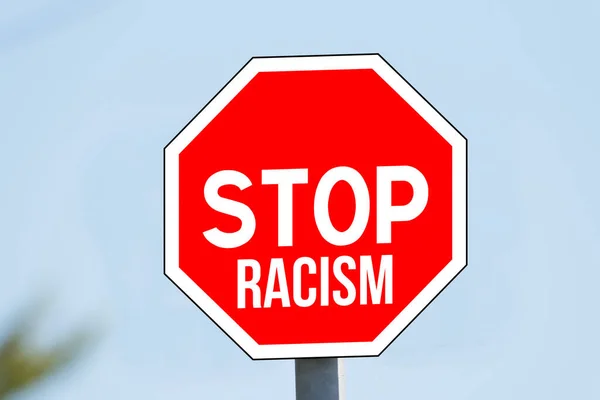 A traffic sign stop racism