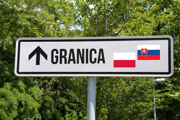 A sign and border between Poland and Slovakia