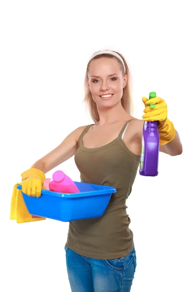 Cheerful woman is cleaning something with wisp and spray attentively. — Stock Photo, Image