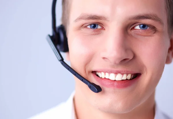 Customer support operator with a headset on white background — Stock Photo, Image