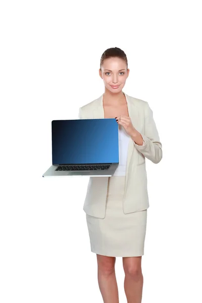 Young beautiful woman showing a laptop, isolated on white background — Stock Photo, Image