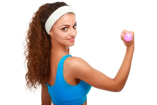 Fitness mujer joven haciendo ejercicio con la mancuerna —  Fotos de Stock