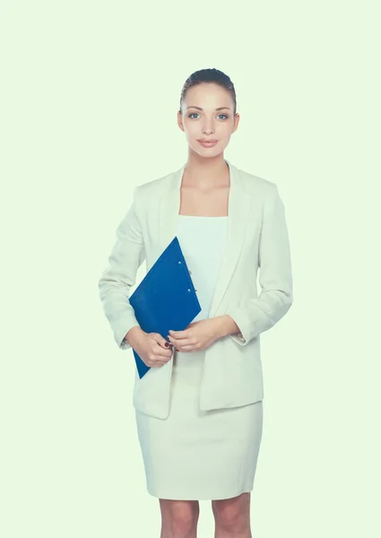 Portrait of a confident young woman standing isolated on white background — Stock Photo, Image