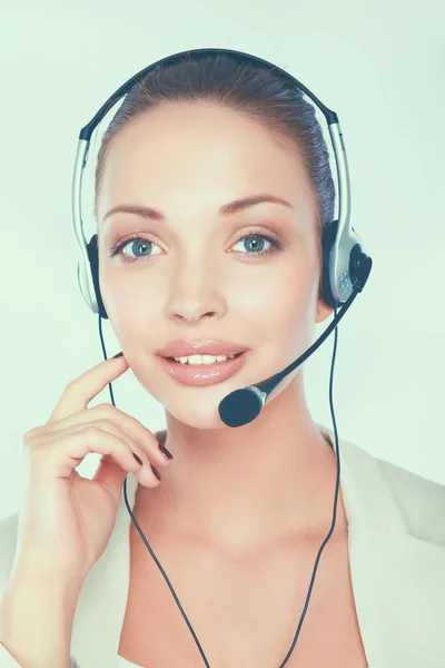 Close-up portrait of smiling young woman with headset isolated on white background — Stock Photo, Image