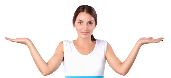 Portrait of a smiling young woman pointing up — Stock Photo, Image